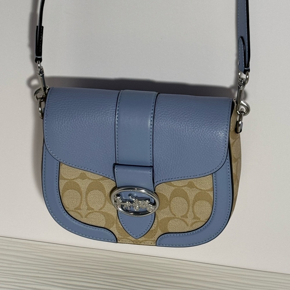 COACH SMALL GEORGIE SADDLE BAG IN LIGHT BLUE LEATHER AND TAN SIGNATURE CANVAS